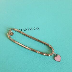 Tiffany silver bracelet with pink heart